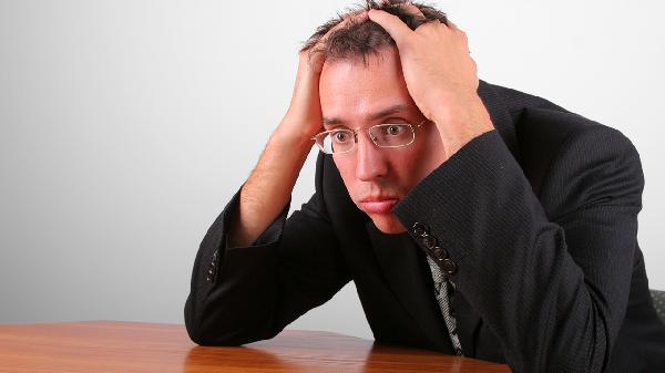 Why do men frequently experience nocturnal emissions?