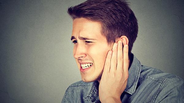 What should men do if they experience frequent nighttime urination?