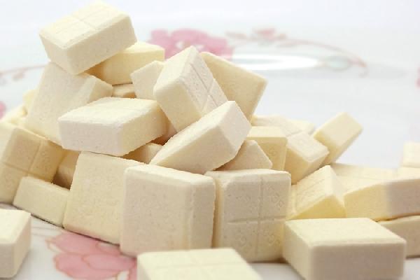 Ever Wondered What Those Crunchy White Bits on Cheese Really Are?